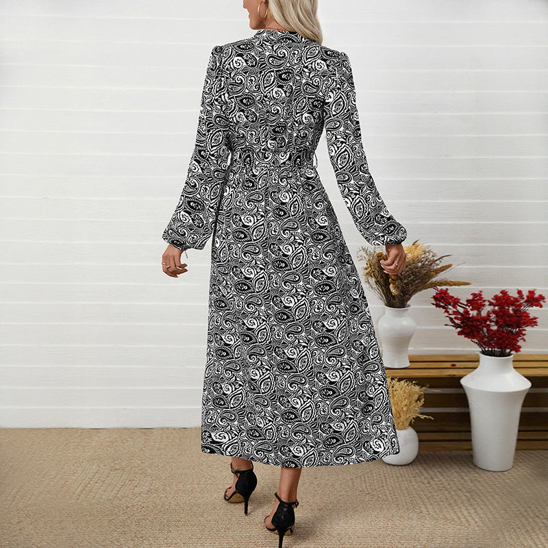 Robe Élégante à Imprimé Ethnique – Col en V et Manches Longues