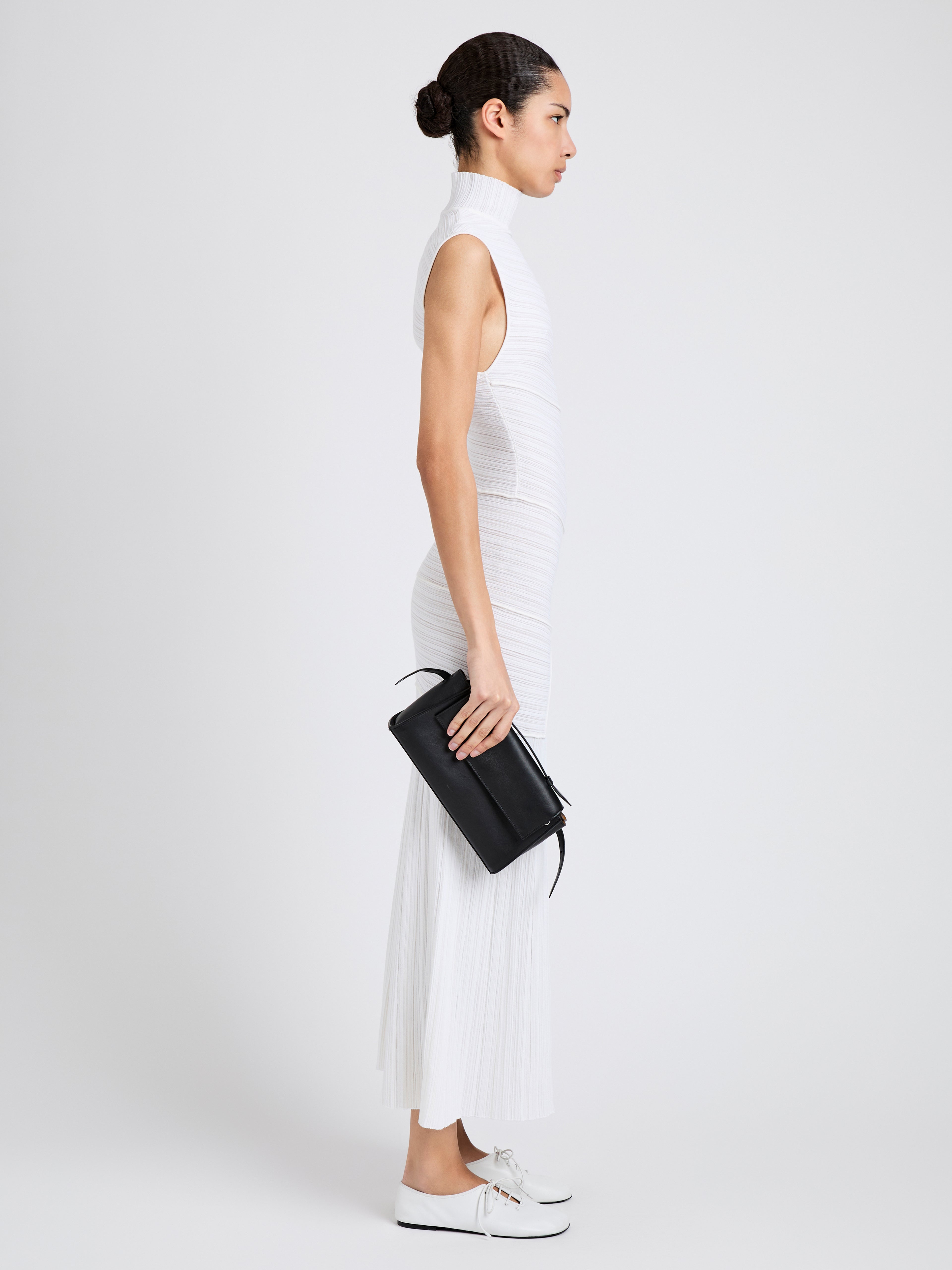 Tate Women's Black Clutch | Smooth Calfskin, Versatile Design 1