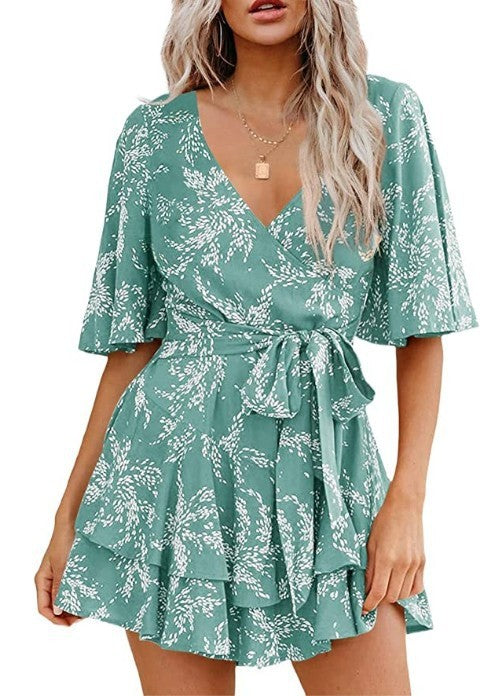 Robe plissée florale à col en V, manches évasées et ceinture à la taille