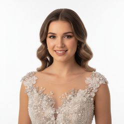 Portrait of Ashley Miller, a young woman with a friendly expression, wearing a white ruffle mermaid wedding dress, against a 
